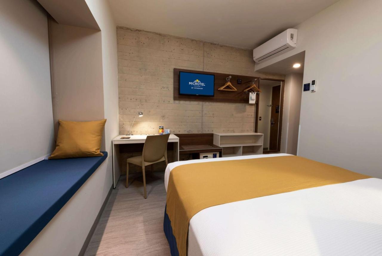 Microtel Inn & Suites By Wyndham Guadalajara Sur Palomar Екстериор снимка